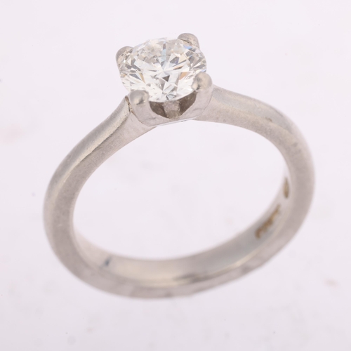 1344 - A GIA certified platinum 0.73ct single stone diamond ring, claw set with modern round brilliant-cut ... 