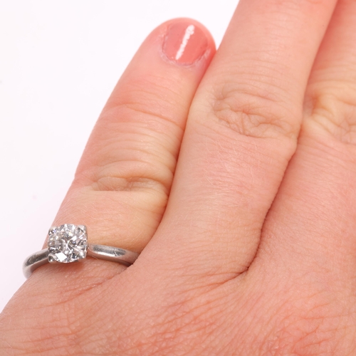 1344 - A GIA certified platinum 0.73ct single stone diamond ring, claw set with modern round brilliant-cut ... 