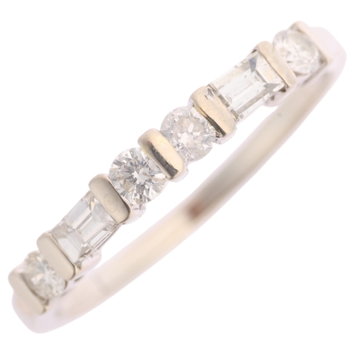 1350 - A 14ct white gold diamond half eternity ring, bar set with modern round brilliant and baguette-cut d... 