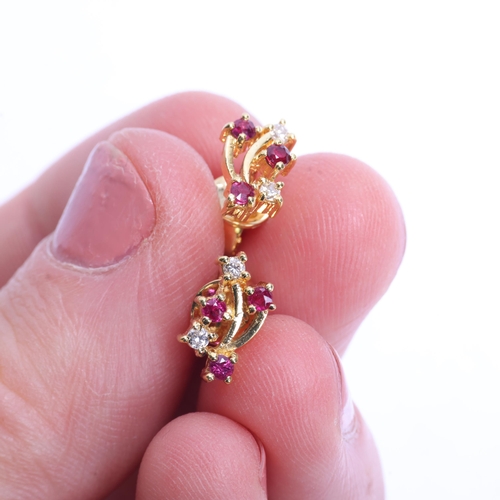 1354 - A pair  of 18ct gold ruby and diamond stud earrings, set with round-cut rubies and modern round bril... 
