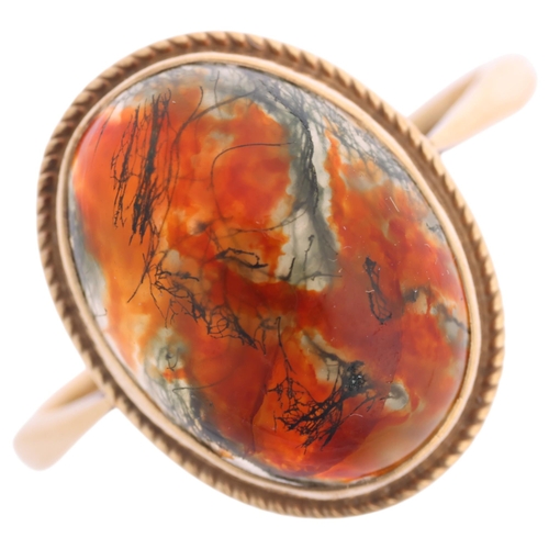 1356 - A 9ct gold moss agate dress ring, maker FKB Ltd, Birmingham 1971, rub-over set with oval cabochon mo... 