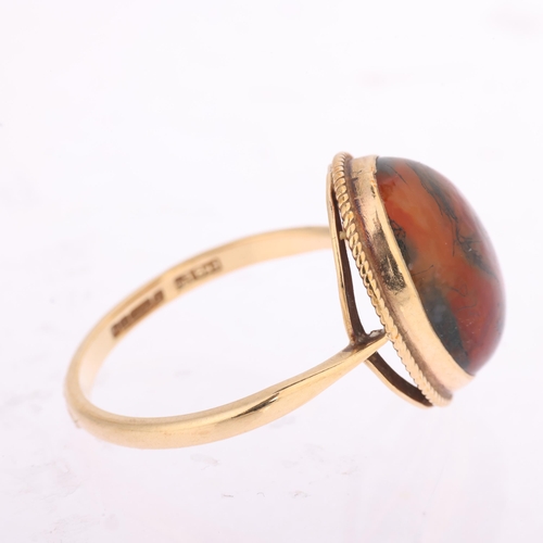 1356 - A 9ct gold moss agate dress ring, maker FKB Ltd, Birmingham 1971, rub-over set with oval cabochon mo... 