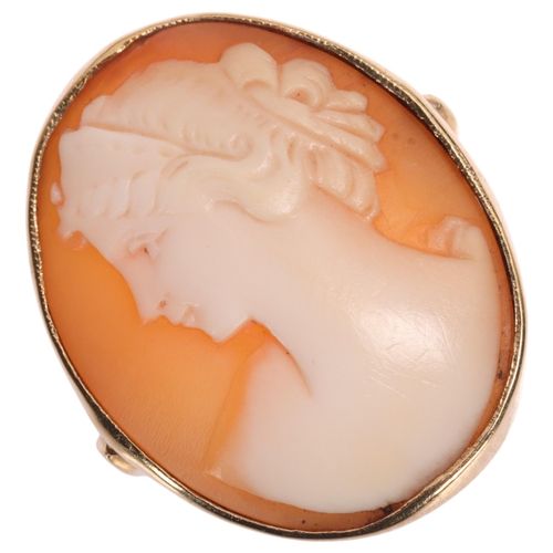 1367 - A 9ct gold shell cameo panel ring, maker L&W, Birmingham 1963, the oval panel relief carved depictin... 