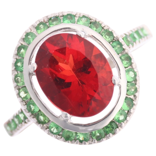 1368 - An 18ct white gold Mozambique garnet and chrome diopside halo cluster ring, claw set with oval mixed... 