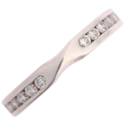 1373 - A platinum diamond half eternity ring, maker Gs possibly Garrards Ltd, London 2006, channel set with... 