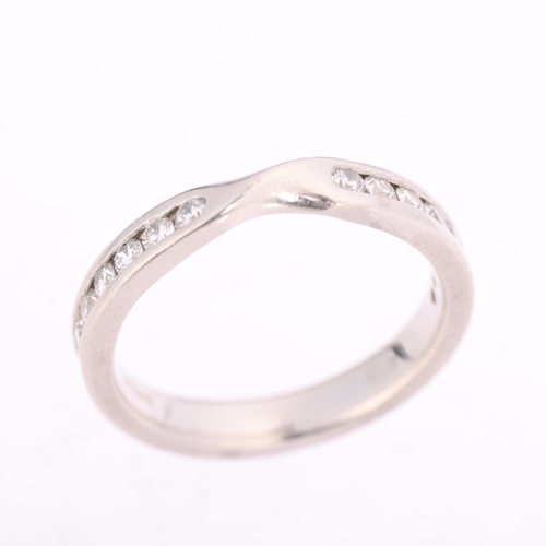 1373 - A platinum diamond half eternity ring, maker Gs possibly Garrards Ltd, London 2006, channel set with... 