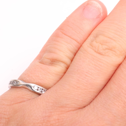 1373 - A platinum diamond half eternity ring, maker Gs possibly Garrards Ltd, London 2006, channel set with... 