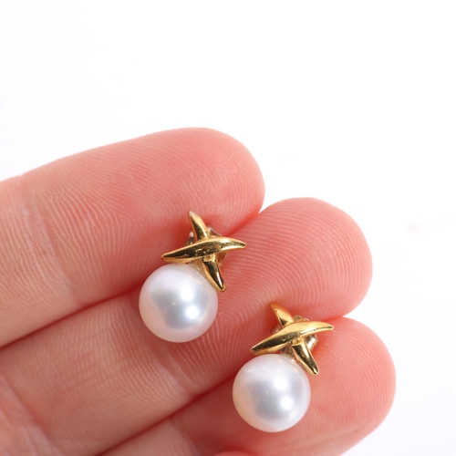 1377 - A pair of 9ct gold whole cultured pearl stud earrings, set with 8.2mm pearls beneath X motif, 2.4g