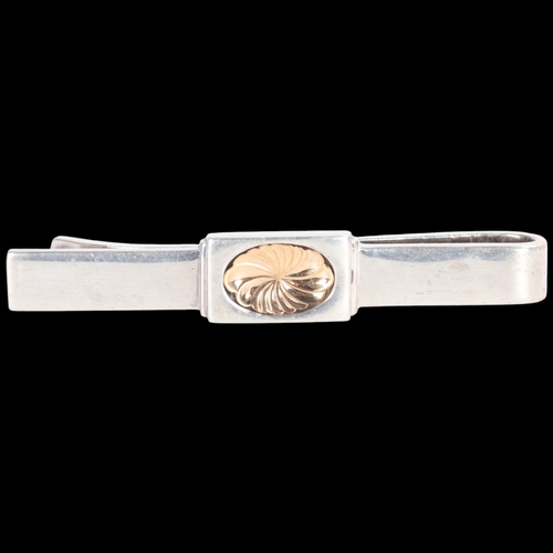 1569 - GEORG JENSEN - a Danish modernist sterling silver-gilt tie clip, designed by Henry Pilstrup, model n... 