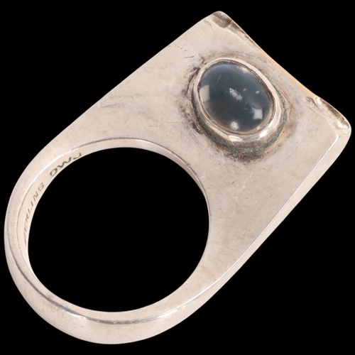 1575 - A Continental modernist sterling silver moonstone and turquoise abstract ring, maker DWJ, with gilde... 