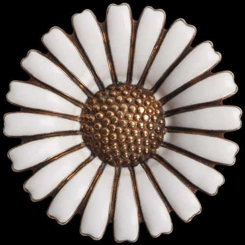 1577 - VOLMER BAHNER - a Danish modernist sterling silver-gilt white enamel daisy pattern brooch, 36.4mm, 1... 