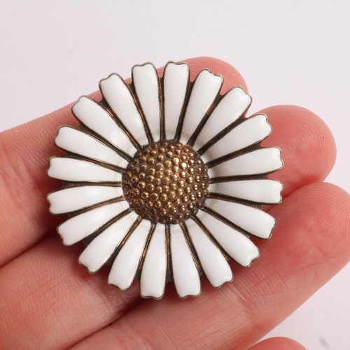 1577 - VOLMER BAHNER - a Danish modernist sterling silver-gilt white enamel daisy pattern brooch, 36.4mm, 1... 