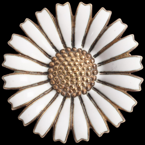 1579 - ANTON MICHELSEN - a Danish modernist sterling silver-gilt white enamel daisy pattern brooch, 32.2mm,... 
