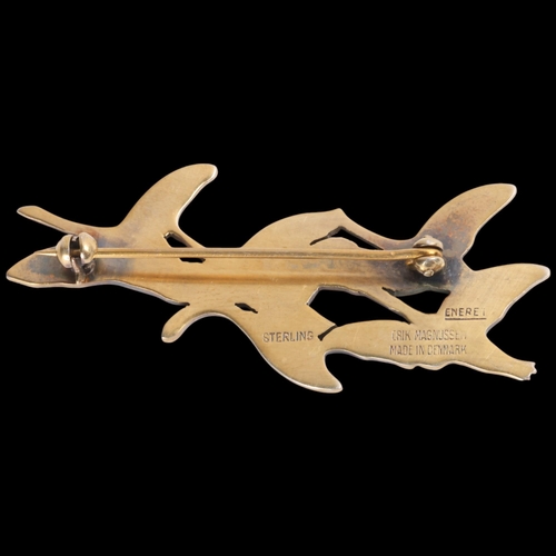 1586 - ERIK MAGNUSSEN - a Danish modernist sterling silver-gilt enamel 'Eneret' flying geese brooch, 59.3mm... 