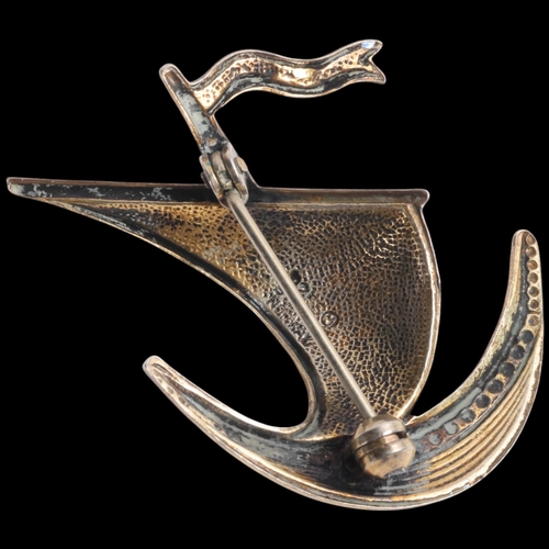 1588 - IVAR T HOLTH - a Norwegian modernist sterling silver-gilt enamel Viking Ship brooch, 33.7mm, 3.6g