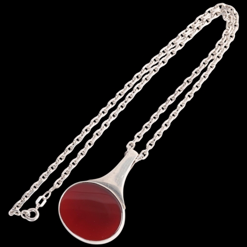 1589 - NIELS ERIK FROM - a Danish modernist sterling silver carnelian pendant necklace, plain oval form, on... 