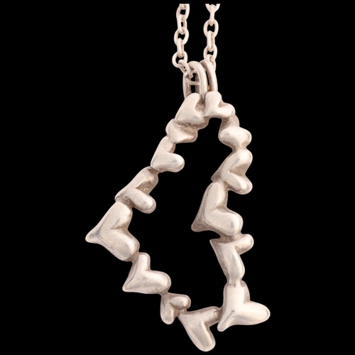 1596 - HANS HANSEN - a Danish modernist sterling silver heart pendant necklace, on sterling cable link chai... 