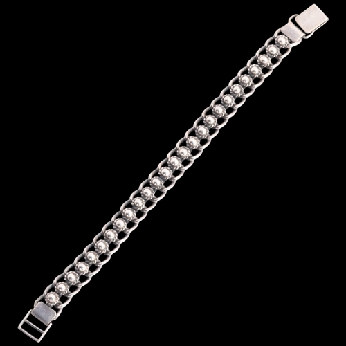 1599 - A Danish sterling silver Viking Revival chain bracelet, maker AY, band width 11.1mm, 18.5g, 34.8g