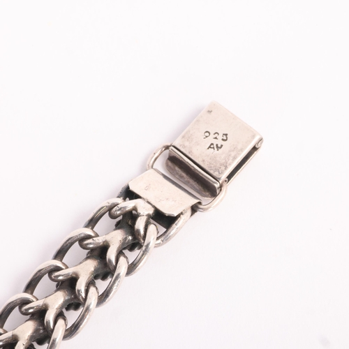 1599 - A Danish sterling silver Viking Revival chain bracelet, maker AY, band width 11.1mm, 18.5g, 34.8g
