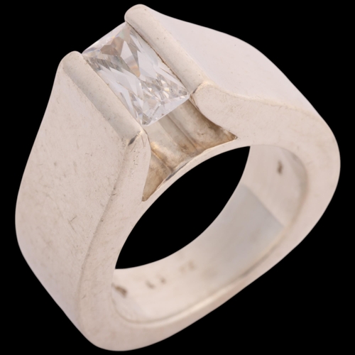1603 - JENS JOHS AAGAARD - a heavy Danish modernist sterling silver cubic zirconia tank ring, setting heigh... 