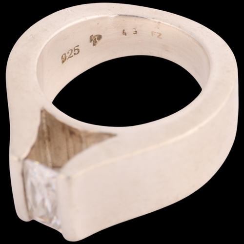 1603 - JENS JOHS AAGAARD - a heavy Danish modernist sterling silver cubic zirconia tank ring, setting heigh... 