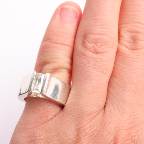 1603 - JENS JOHS AAGAARD - a heavy Danish modernist sterling silver cubic zirconia tank ring, setting heigh... 