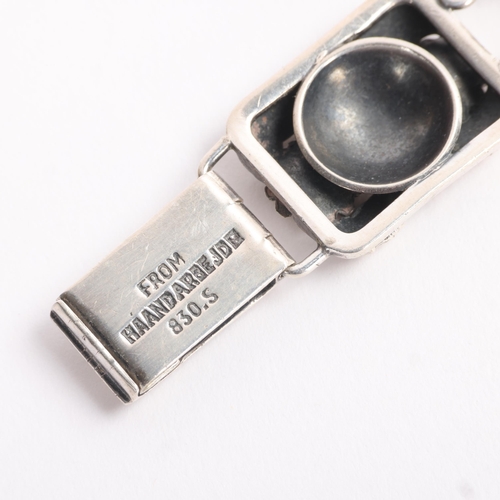 1604 - NIELS ERIK FROM - an Art Deco style Danish stylised silver floral panel bracelet, band width 14.9mm,... 