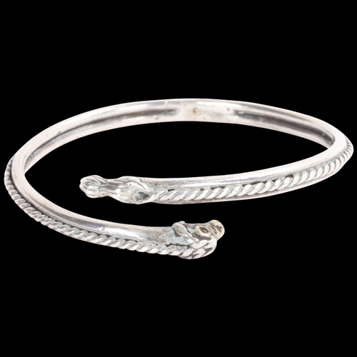 1610 - KOPI SMYKKER - a Danish sterling silver Viking Revival torque bangle, band width 5.5mm, internal cir... 