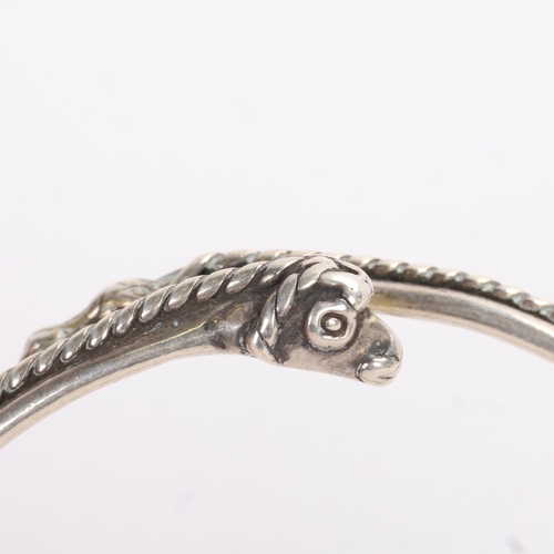 1610 - KOPI SMYKKER - a Danish sterling silver Viking Revival torque bangle, band width 5.5mm, internal cir... 