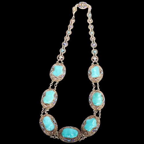 1611 - A Continental sterling silver-gilt turquoise enamel 'Chinoiserie' panel necklace, unsigned, possibly... 