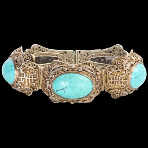 1612 - A Continental silver-gilt turquoise 'Chinoiserie' panel bracelet, unsigned, possibly Erik Poul Fenst... 