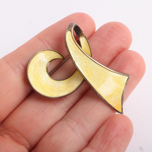 1616 - IVAR T HOLTH - a Norwegian modernist vermeil sterling silver yellow enamel abstract ribbon brooch, 4... 