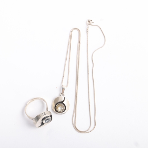 1623 - KARL LAINE - a Finnish modernist sterling silver rock crystal quartz openwork pendant necklace and r... 