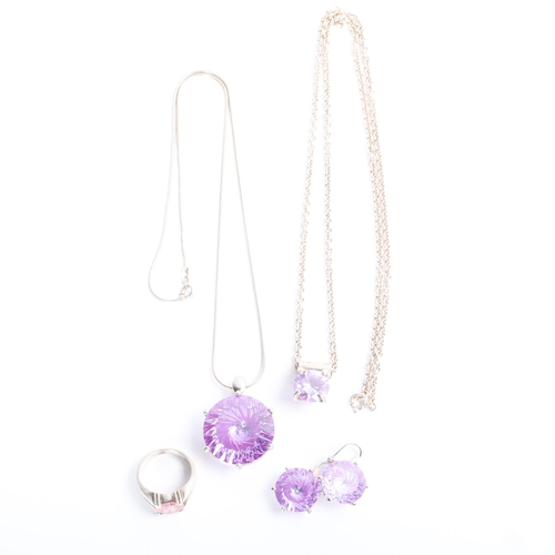 1637 - A group of sterling silver cubic zirconia jewellery, including fantasy-cut pendant necklace and earr... 