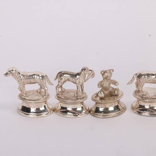 1705 - THEO FENNELL - a set of 10 sterling silver menu card holders, circa 1980s, modelled as various anima... 
