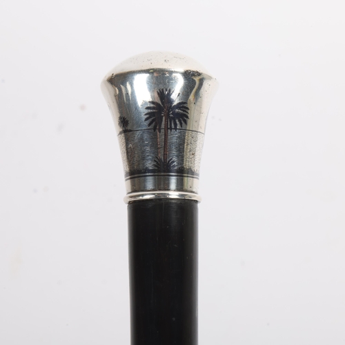 304 - An Iraqi silver and niello handle walking cane, with monogram PER to the top and a seashore scene wi... 