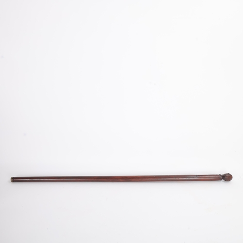 308 - A one-piece Folk Art colliers’ cane, the top carved as a helmeted miner's head with nails for eyes a... 
