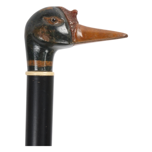 313 - An Antique 19th Century carved and painted wooden duck head handle walking cane, (possibly a Shelduc... 