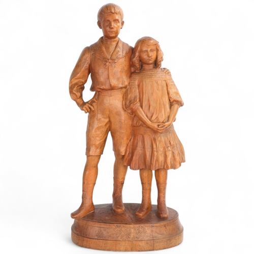 339 - George Iselin (1874 - 1952), a large carved boxwood sculpture, portrait of a boy and girl, signed an... 