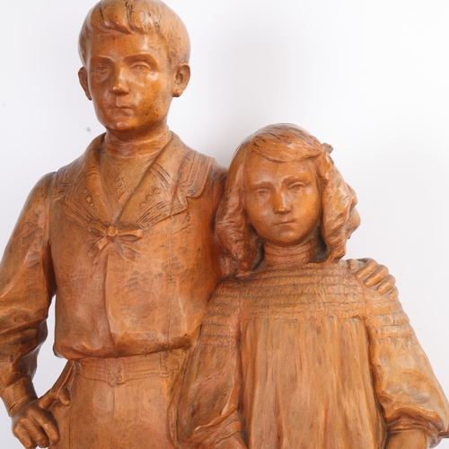 339 - George Iselin (1874 - 1952), a large carved boxwood sculpture, portrait of a boy and girl, signed an... 