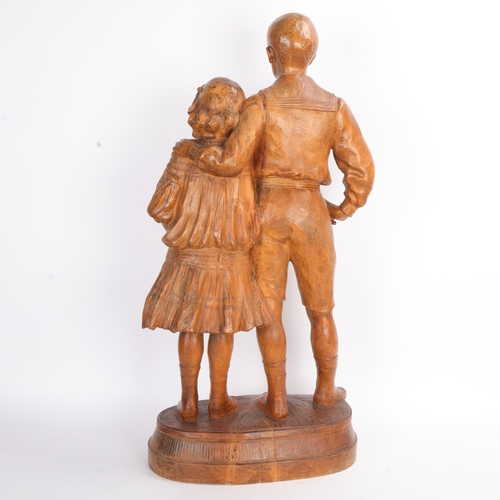 339 - George Iselin (1874 - 1952), a large carved boxwood sculpture, portrait of a boy and girl, signed an... 