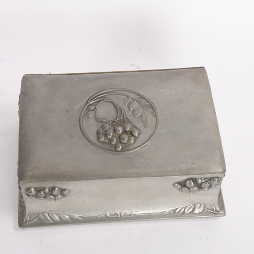 348 - An Art Nouveau pewter cigarette box, with relief fruit decoration, width 15cm