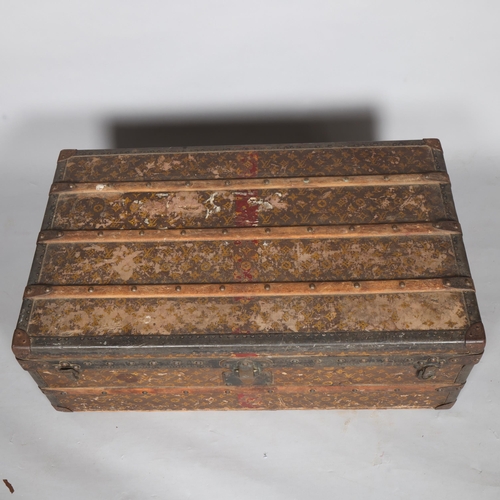 330A - LOUIS VUITTON - a Vintage monogram steamer trunk, brass furniture, lined interior and original label... 