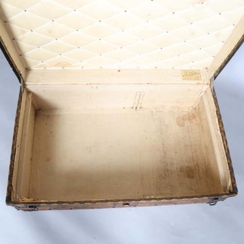 330A - LOUIS VUITTON - a Vintage monogram steamer trunk, brass furniture, lined interior and original label... 