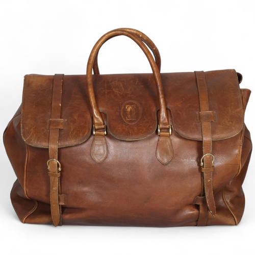 331A - A gents vintage large brown leather travelling bag, with black fabric lining, approx length 50cm, de... 