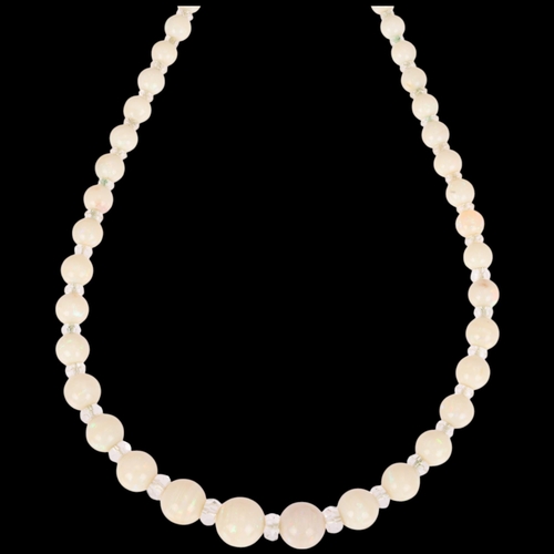 1114 - An Art Deco opal and paste collar necklace, set with graduated opal beads measuring from 12.6-4.6mm,... 