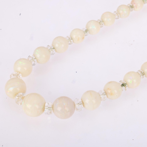 1114 - An Art Deco opal and paste collar necklace, set with graduated opal beads measuring from 12.6-4.6mm,... 
