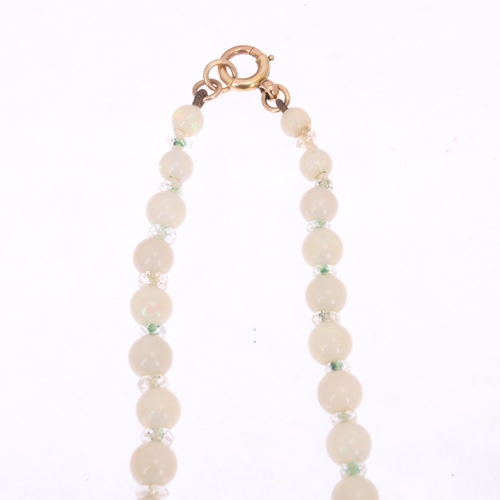 1114 - An Art Deco opal and paste collar necklace, set with graduated opal beads measuring from 12.6-4.6mm,... 