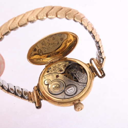 1022 - LADY ELGIN - an Antique lady's 18ct gold Officer's style mechanical wristwatch, white enamel dial wi... 