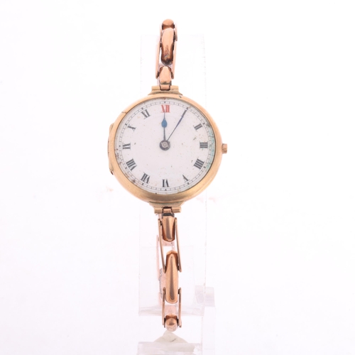 1024 - An Antique 9ct rose gold Officer's style mechanical bracelet watch, white enamel dial with black Rom... 